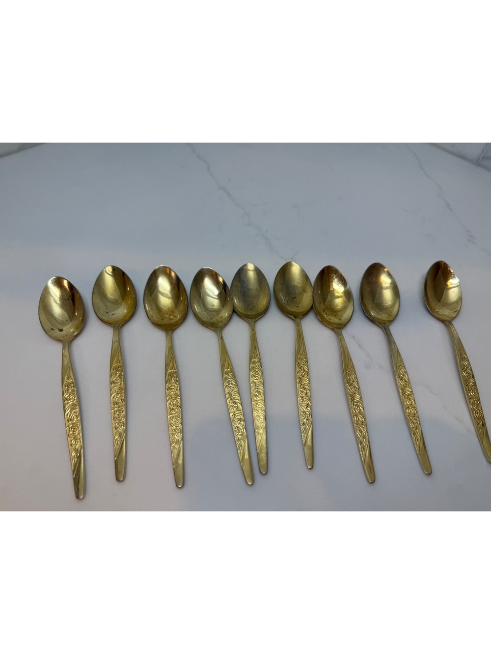 Set of 9 Vintage Gold-Toned Dessert Spoons with Floral Engraving